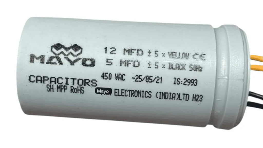 Washing Machine Capacitor Problem? Diagnose and Replace It Like a Pro 1 Inspecting and replacing a washing machine capacitor with a multimeter.